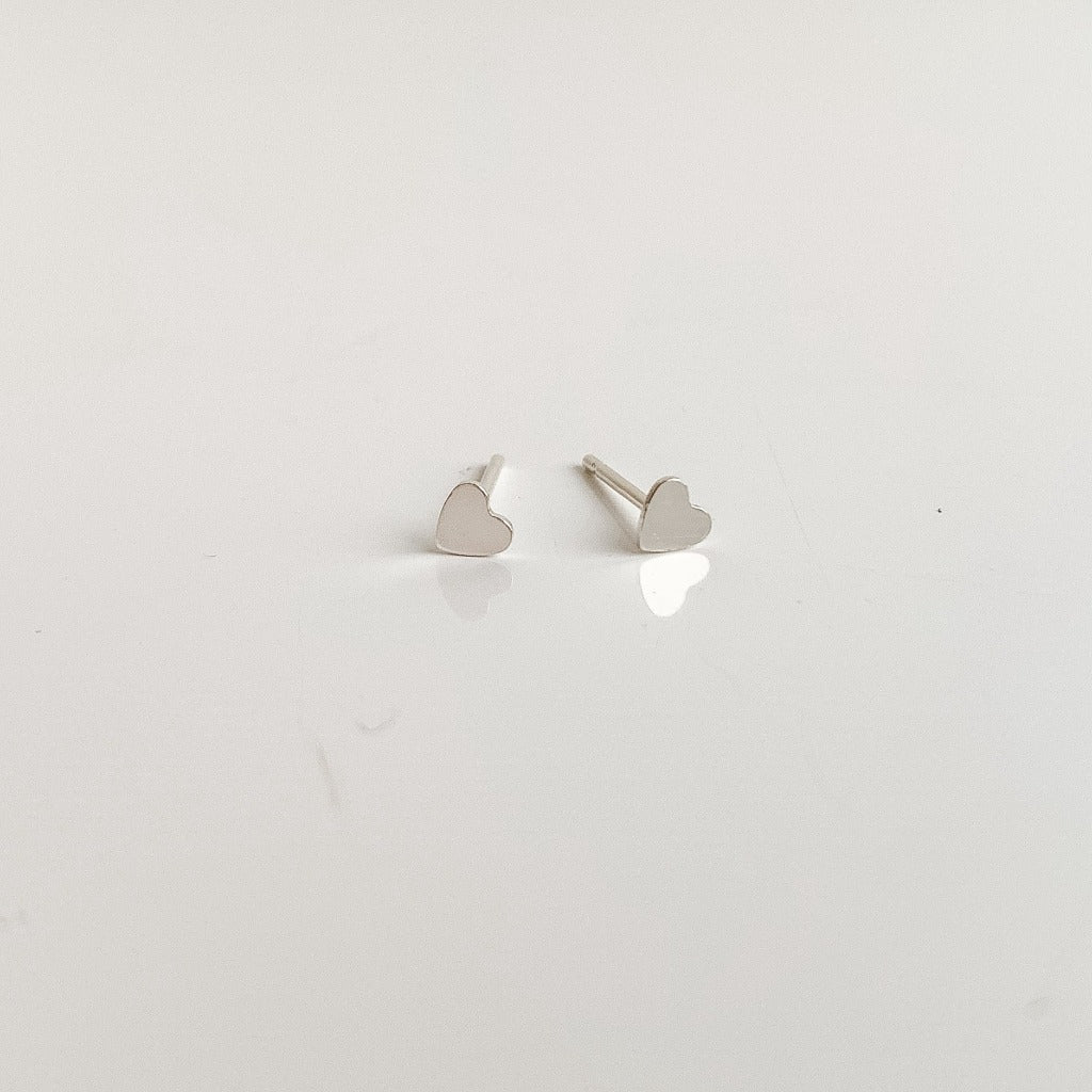 sterling silver tiny heart studs earrings by Adorned by Ruth