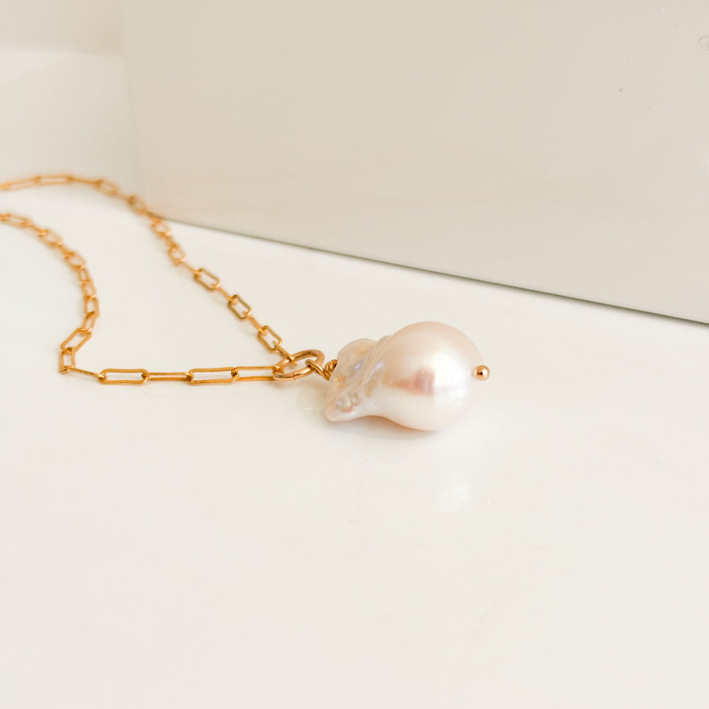a large baroque fireball pearl pendant necklace on 14k gold filled chain.