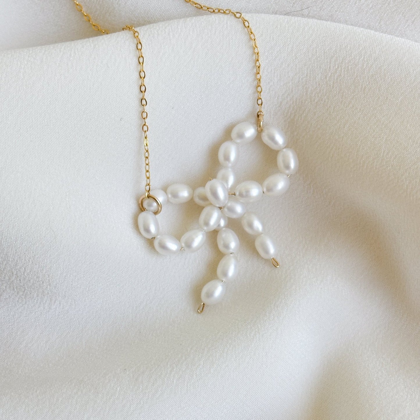 Pearl Bow Tie Ribbon Pendant Necklace
