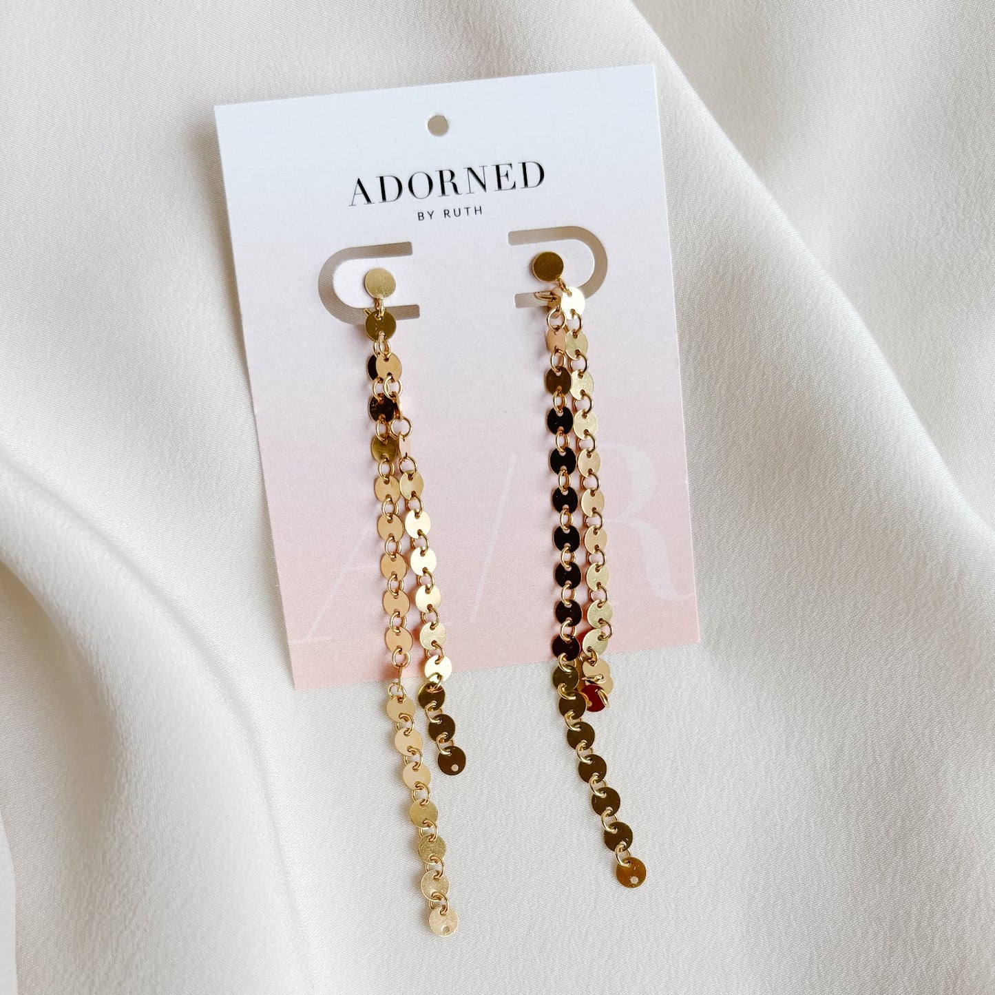 gold disc post earrings in 14K gold filled featuring two long dangling gold disc chains.