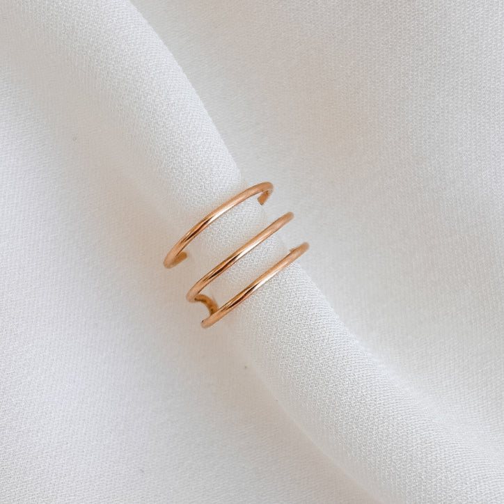 a dainty 14k gold filled triple band ear cuff