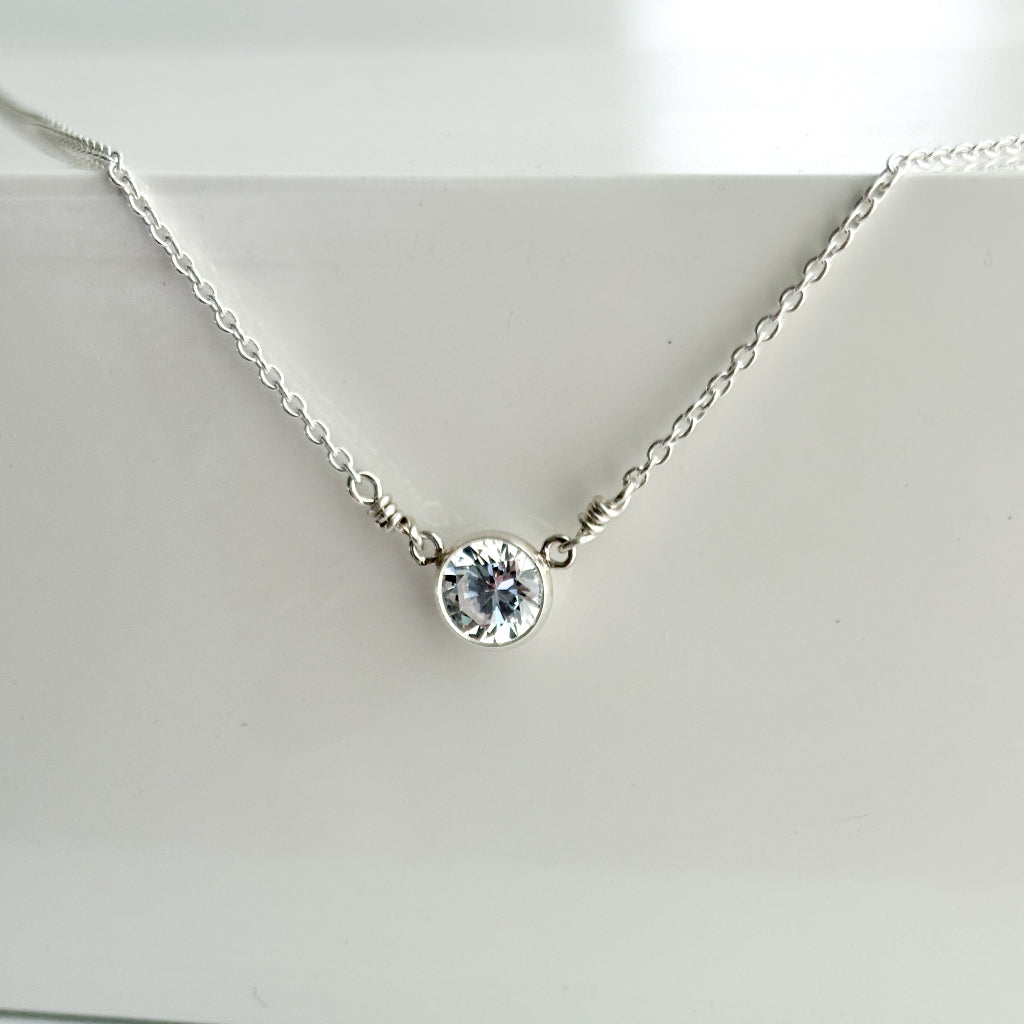 Silver CZ solitaire necklace  on a white background