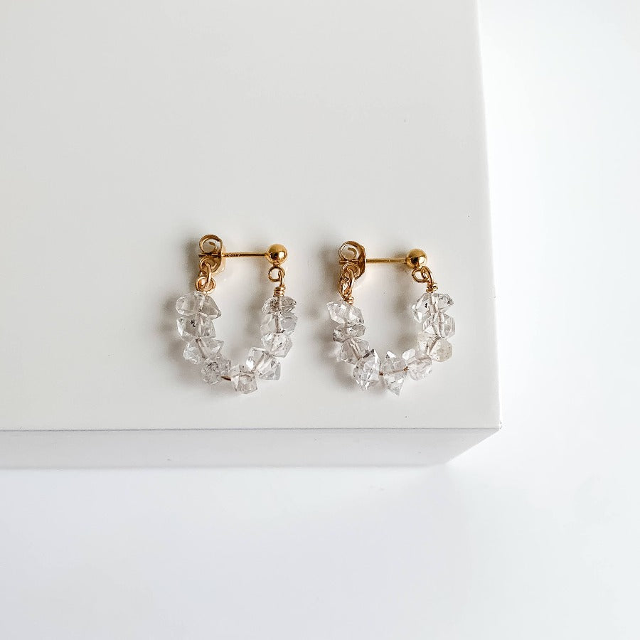 ADORNED By Ruth wrap around stud earrings set with raw Herkimer Diamonds.