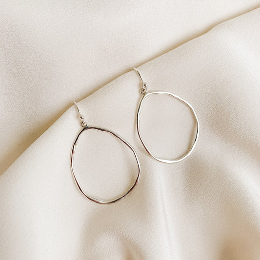 sleek open teardrop shaped hoop earrings in sterling silver